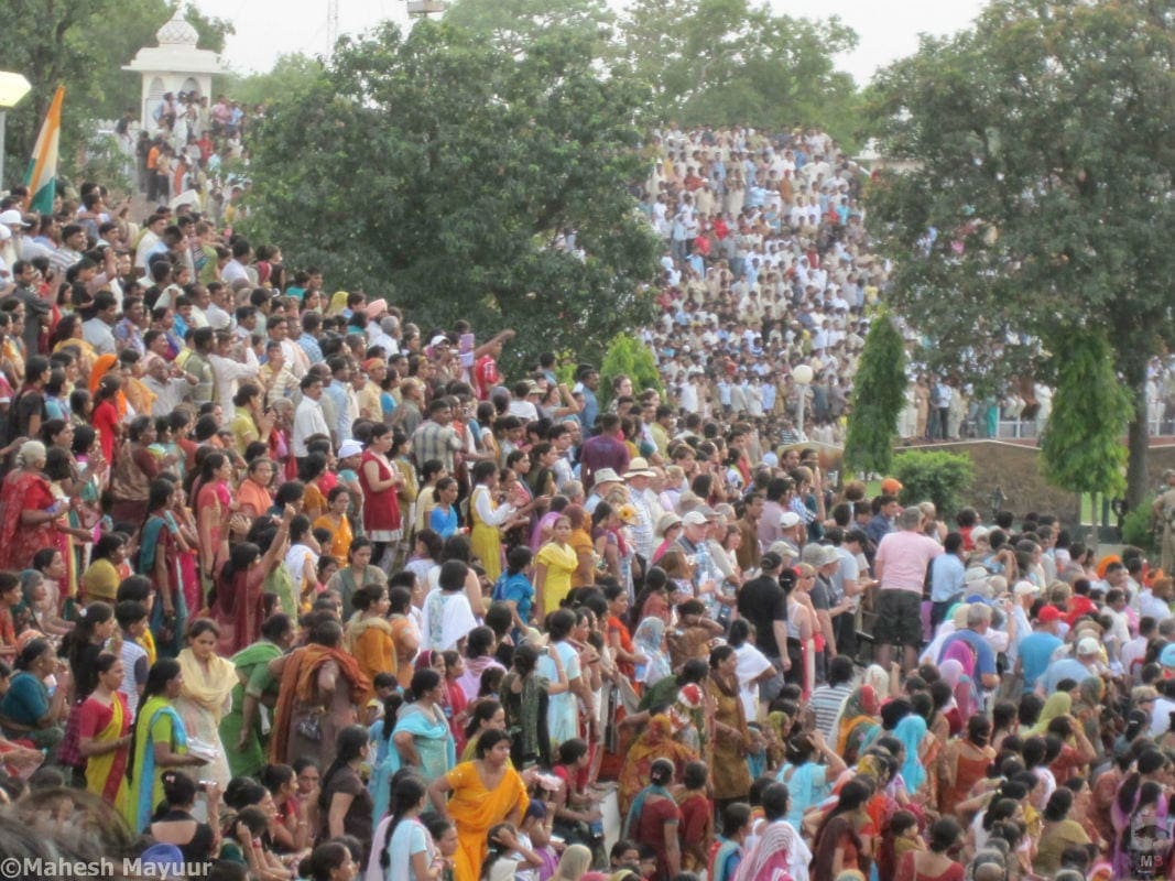 Crowds gather on the Indian side of the Wagah Border with Pakistan to witness the daily closing up of the Border gate