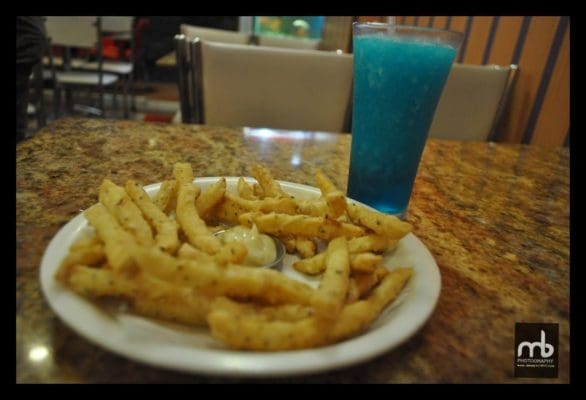 Crispy Finger Chips with Blue Lagoon Drink at Cafe Seven Bees, Manipal.