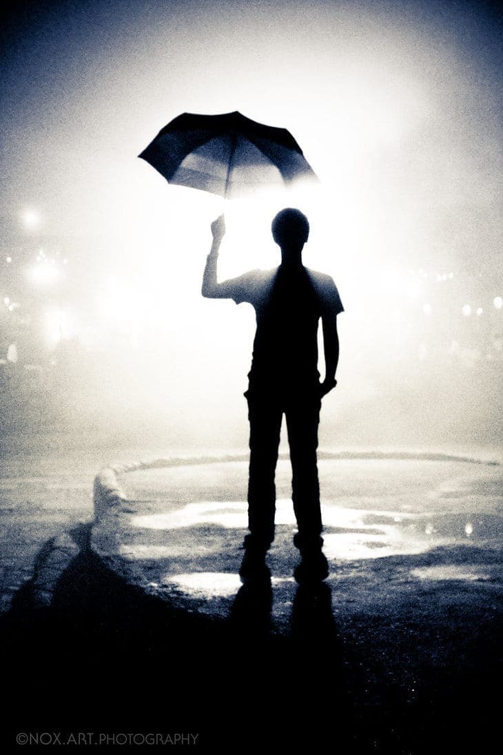 the_umbrella_man_by_lilreaper