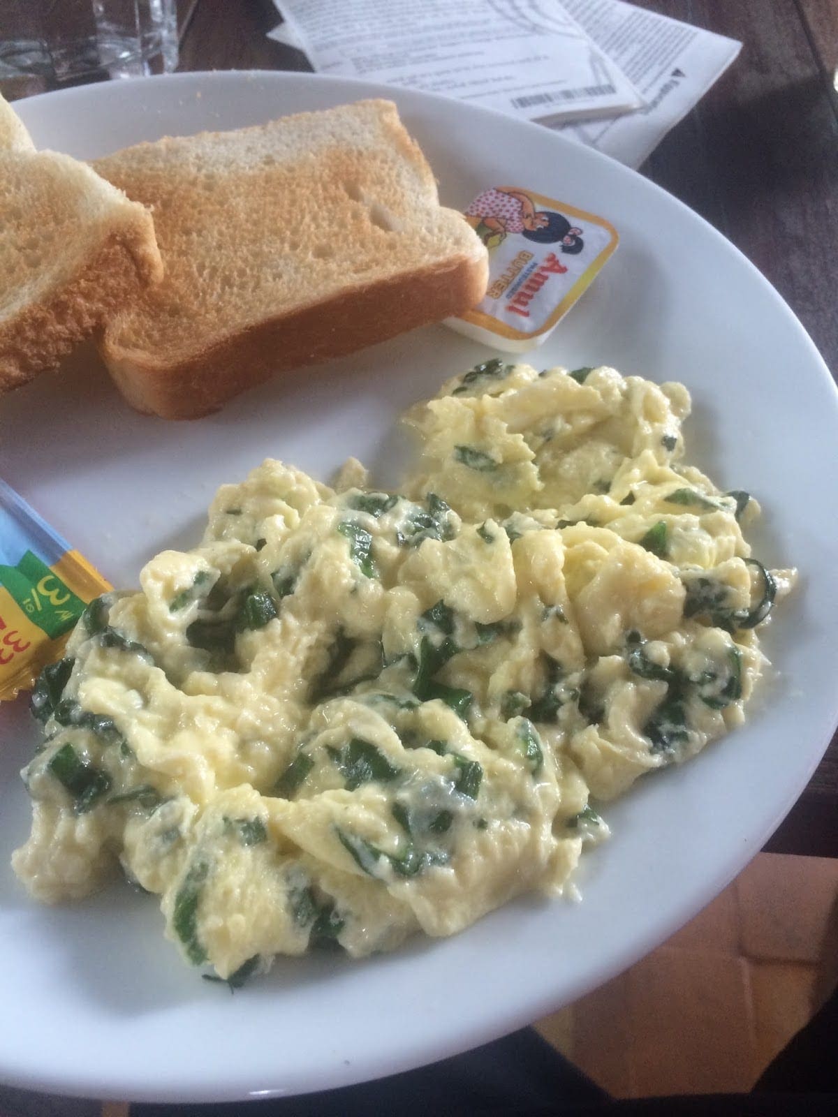 Creamy scrambled eggs with spinach