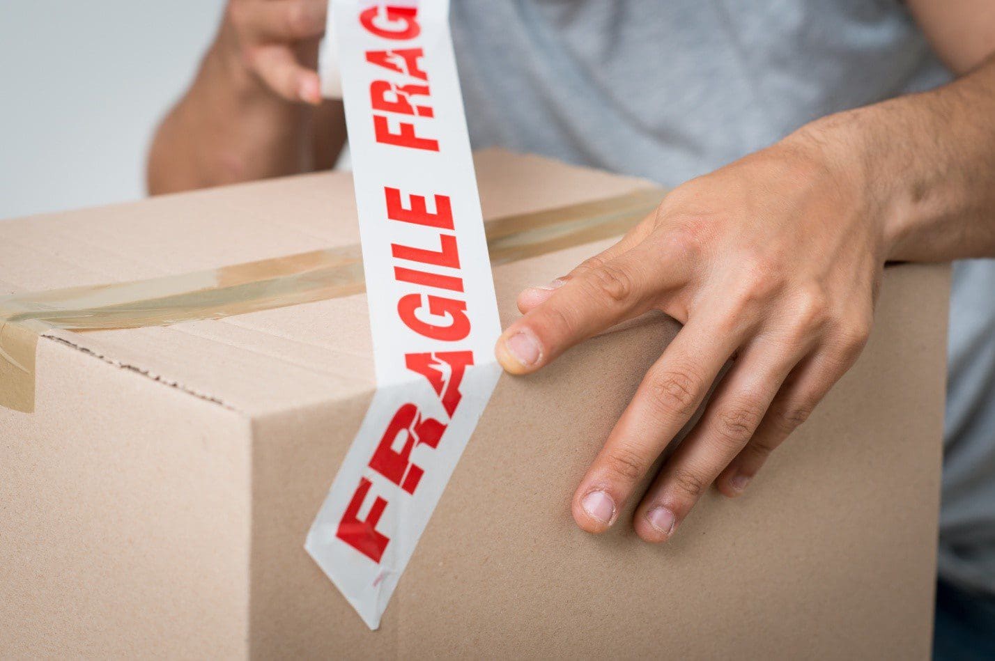 Packing tape over a cardboard box